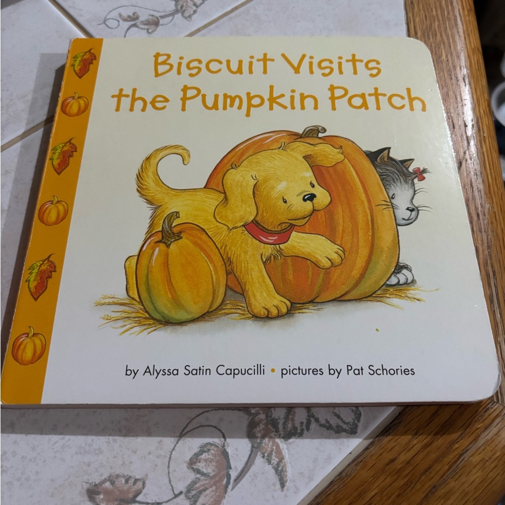 Biscuit Visits the Pumpkin Patch Children’s Board Book - Yellow/Orange